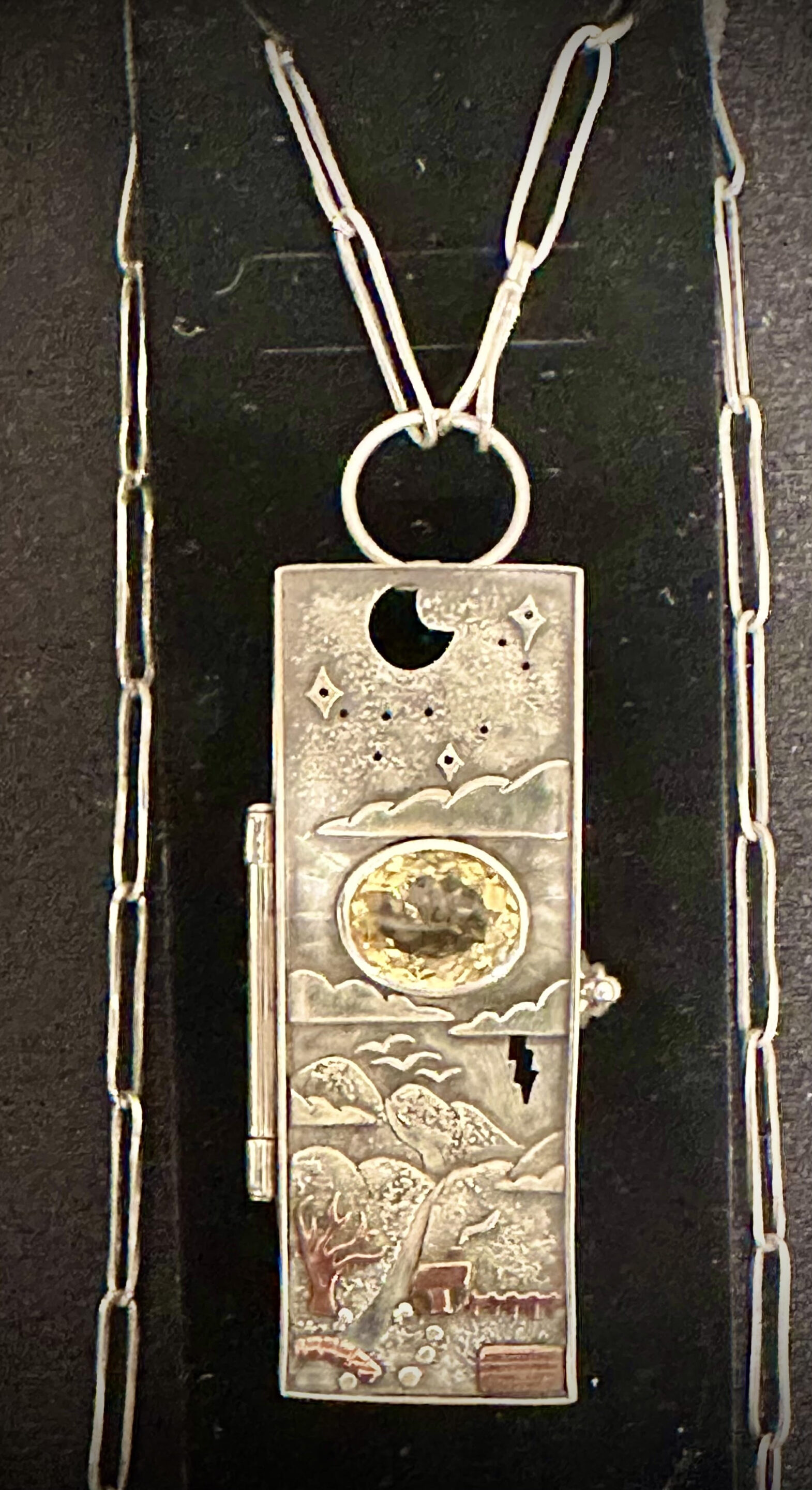 Silver Locket by Cassidy Sidden